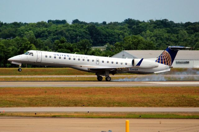 N14125 — - An United Express Embraer 145XR touching down on 2C Nashville