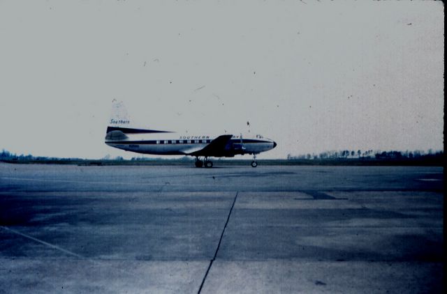 MARTIN 404 (N258S) - Aircraft bound for Nashville, Tennessee is taxiing to active runway at Knoxville, Tennessee (KTYS).  Fall, 1967