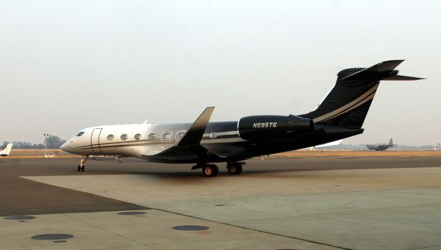 Gulfstream Aerospace Gulfstream G650 (N595TG) - KRDD - surprised to see the beauty turn out for the runway! We don't see that many G650s out this way. This was on the ground 20mins and departed on a smoke filled day - great looking jet!