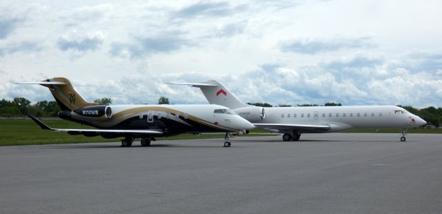 Bombardier Global Express (N1886N) - Sharing the parking with a Challenger 350 is a 2020 Bombardier Global Express 6500 in the Spring of 2024.