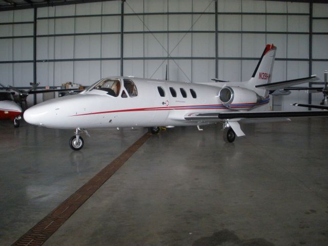 Cessna Citation 1SP (BLU39) - Sitting in the hangar at Indianapolis Executive Airport.