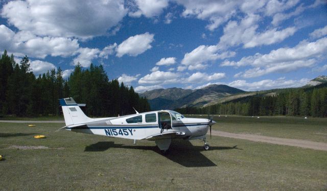 Beechcraft 35 Bonanza (N1545Y) - Spotted Bear Air Strip.  Just south of hungry horse resevoir.  Great camping and fishing.