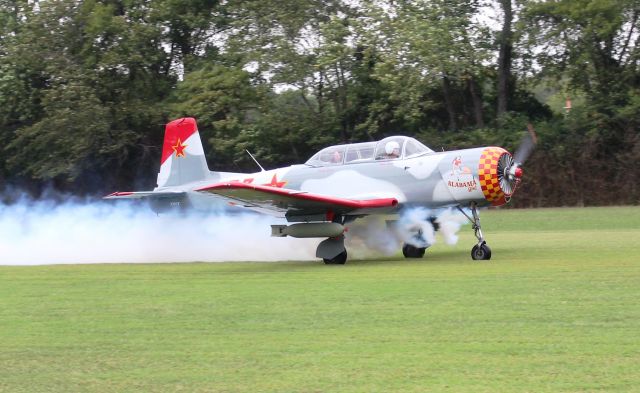 NANCHANG PT-6 (N33CY) - A Nanchang CJ-6A pushing smoke on his takeoff roll at the EAA 190 Annual Fly-In at Moontown Airport in Brownsboro, AL - September 16, 2016.