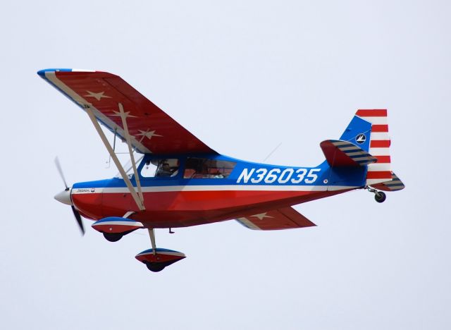 Beechcraft 18 (N36035) - Departing EAA Airventure/Oshkosh on 25 July 2012.