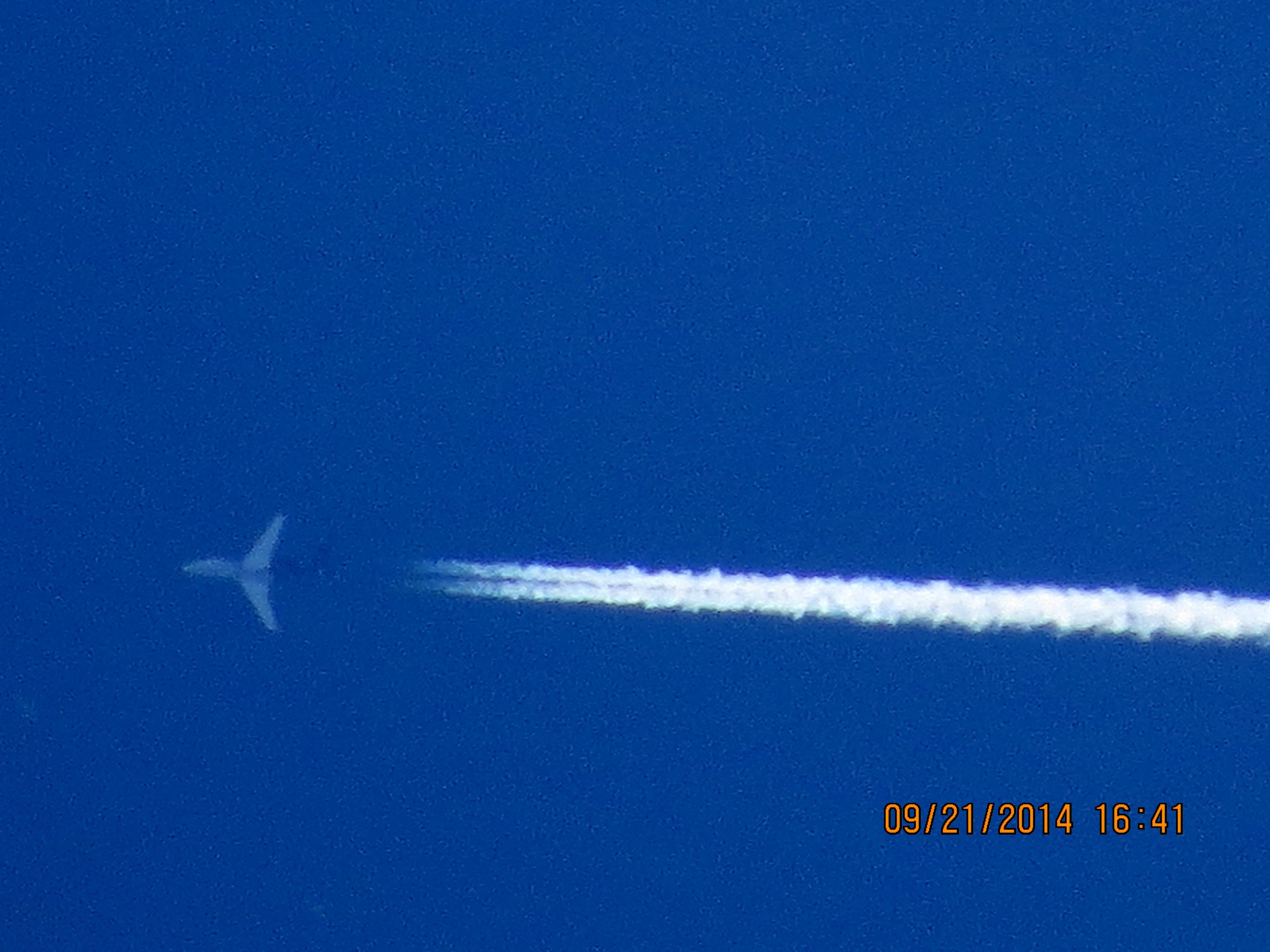 Embraer Phenom 300 (N715DE) - Embraer Phenom 300 from Loveland Colorado to Birmingham Alabama over Baxter Springs Kansas (78KS) at 45,000 feet.