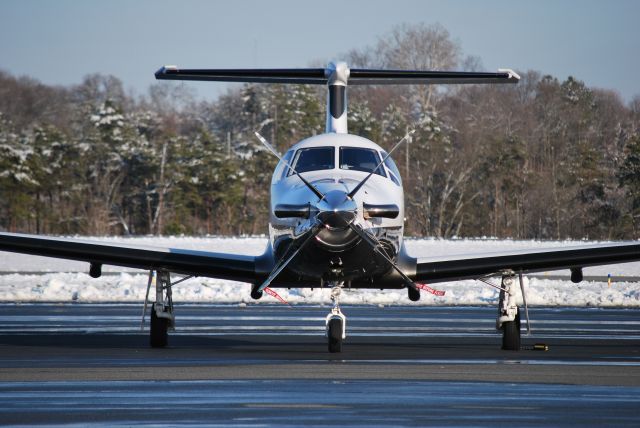 Pilatus PC-12 (N717NC) - PECO AVIATION LLC parked at Concord Regional Airport - 3/2/09