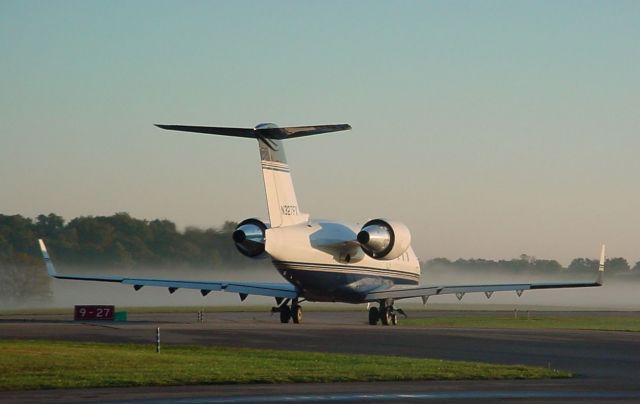 Canadair Challenger (N327FX) - Taxing for 27 departure... What a morning!