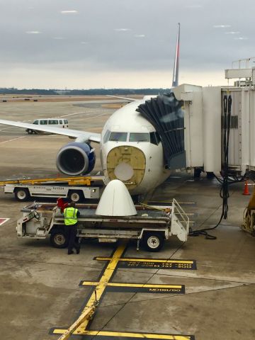Boeing 737-800 (N372DA) - Nose cone removed for maintenance between flights. One hour delay, but at least we had something cool to watch!