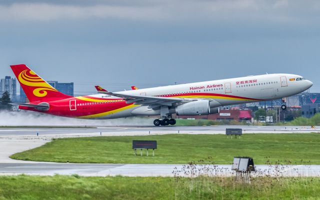 Airbus A330-300 (B-1096) - The return leg gets underway for this Hainan A333 seen here lifting off a soggy runway 05 at YYZ