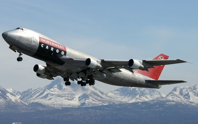 Boeing 747-200 (N629US) - NW 747-200F seen departing PANC with the snow covered Chugach Mountains provided a nice backdrop.