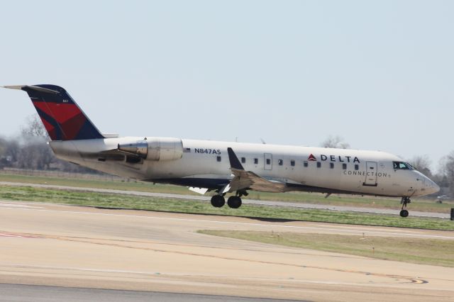 Canadair Regional Jet CRJ-200 (N847AS) - Landing on Runway 32. 