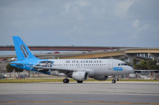 Airbus A319 (N717UW) - Carolina Panthers logo jet positioning for takeoff from Runway 10 at FLL