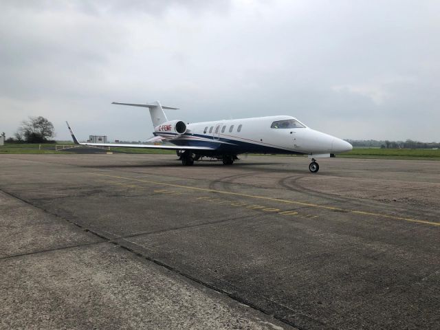 Learjet 40 (C-FEMF) - Parking on the GAT at Belfast International EGAA/BFS on a quick turn 