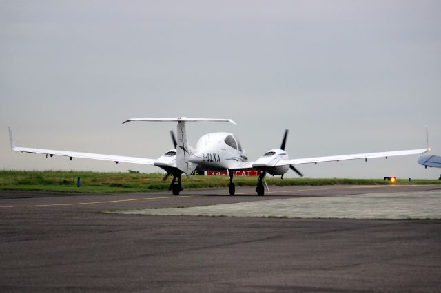 Diamond Twin Star (G-CLKA) - Taxiing to depart rwy 34 on 4-Sep-21.