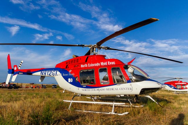 Bell 407 (N912GX) - Waiting with N911GX to escort Northern Colorado Honor Flight #21, 9/9/2018.