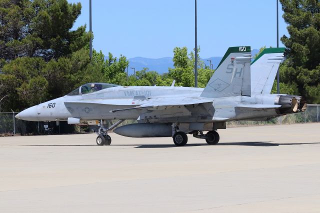 McDonnell Douglas FA-18 Hornet (16-4227) - KRDD - USMC Miramar F/A-18 #16-4227 on the 180 after returning from a training flight/Red Bluff Roundup 2018 flyover for the opening ceremonies 4/21/2018. This Ship #160 and Ship #243 of VMFAT-101 "Sharpshooters" had 6 F-18s on the Tarmac for the weekend flight training but I only saw these 2 Fighter jets fly 2x during the weekend. Sleeping KRDD Airport officials made the F/A-18 viewing difficult where they were parked and narrow views with no fences in the way.