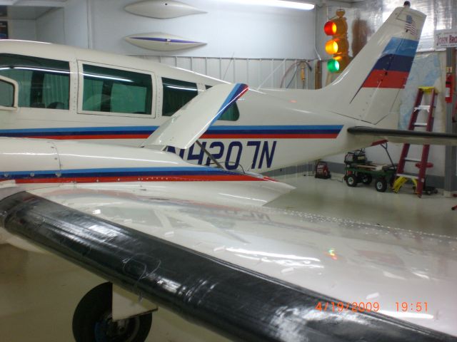 Cessna Executive Skyknight (N4207N) - left wing and boots after a little wax...  1964 Cessna Skynight