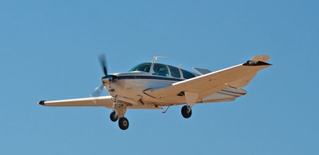 Beechcraft 35 Bonanza (N8623Q) - Aircraft on final to 09 at Carson City