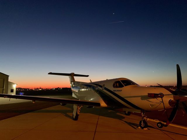 Pilatus PC-12 (N638NG) - I was on the ramp at KPLD and saw this Pilatus sitting while another plane was being defrosted.  Couldn't resist this photo OP.