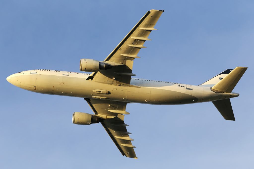 EP-IBC — - Departing LHR.