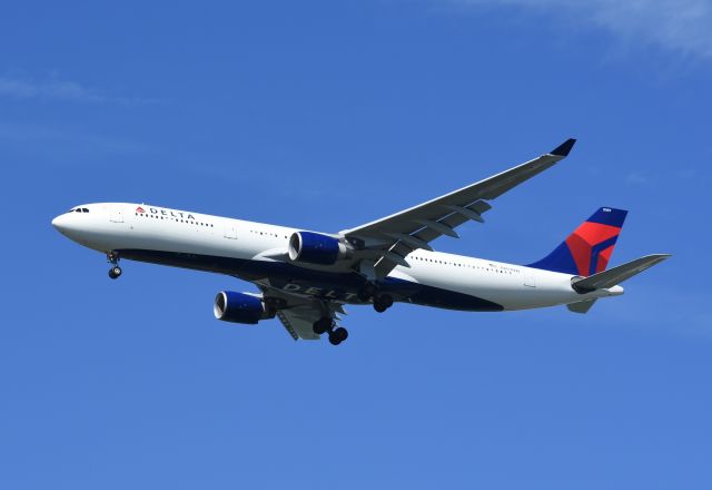 Airbus A330-300 (N807NW) - Delta A330 arriving at JFK with the Delta logo painted on the belly