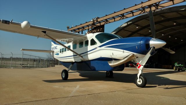 Cessna Caravan (N943AC) - Parked in front of the hangar for washing and photos.