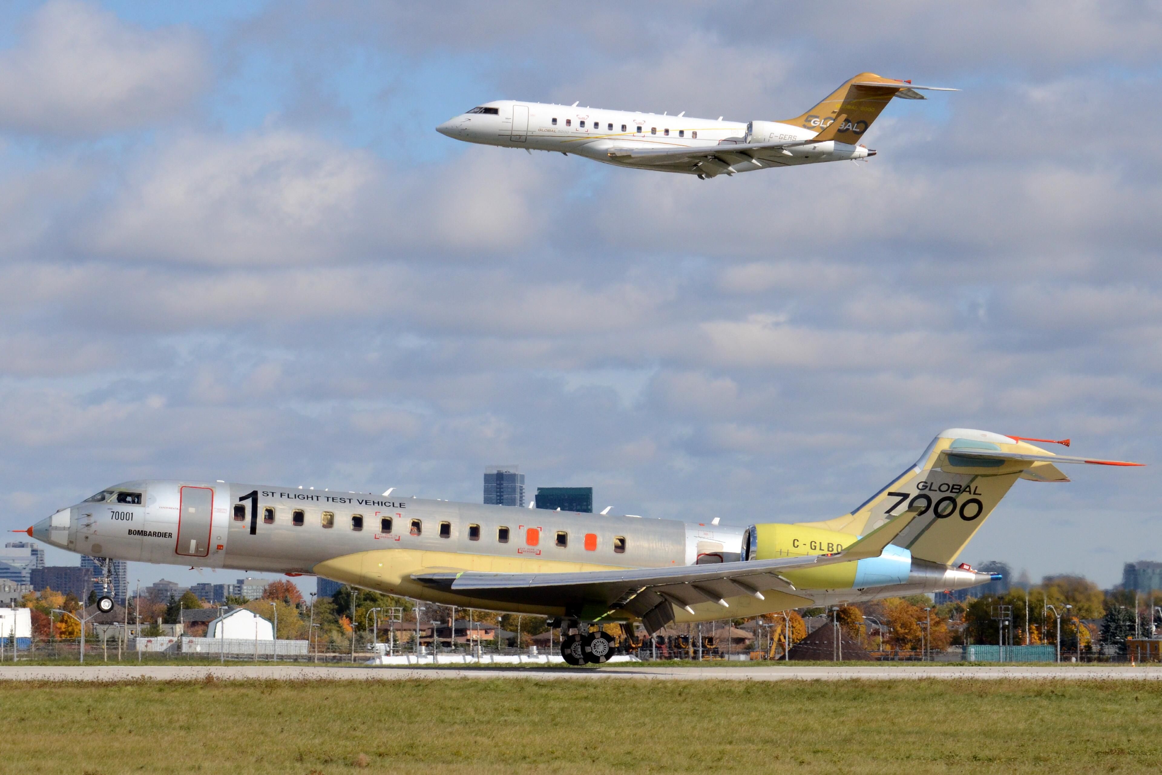 Bombardier Global Express (C-GLBO) - Photographed by Frederick K. Larkin as it landed after its first flight.