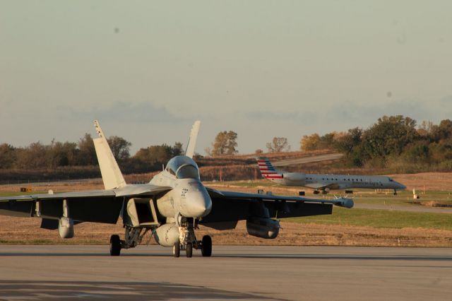 Embraer ERJ-145 — - Embraer 145 and a Hornet