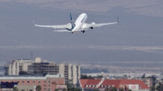 Boeing 737-700 (C-FIBW) - C-FIBW Westjet Boeing 737-700 - cn 37956 / ln 3649br /Age 4 Yearsbr /27-Mar-2015 B737/L McCarran Intl (KLAS) Edmonton Intl (CYEG) 12:54 PDT 16:35 MDT 2:40