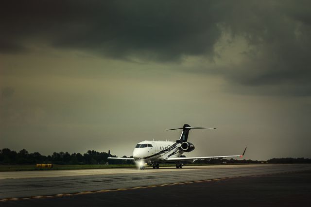 Bombardier Challenger 300 (N101UD) - Making my morning rounds to inspect the flight school airplanes and this sexy beast plane came cruising in.