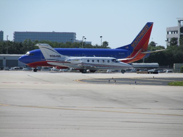 Beechcraft Beechjet (N394BB) - Standing 300 meters from runway 1R hold line