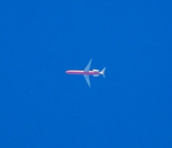 McDonnell Douglas MD-83 (XA-UZI) - Flying over Greenville from GSO-MEX.  Very distinguishable due to the red underside!