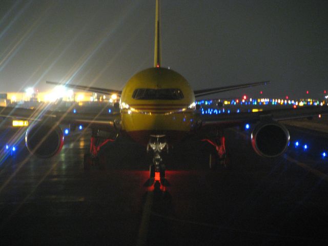 BOEING 767-200 (N702AX) - Facing East on Txy A, holding short of Txy F for departure Rwy 25L. KLAX