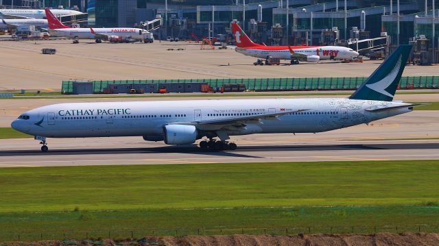 BOEING 777-300 (B-HNK) - Cathay Pacific`s Spirit of Hong Kong livery 777-300.