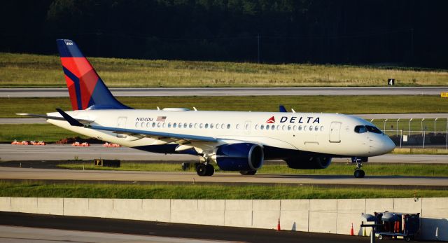 Airbus A220-100 (N104DU) - First visit of the A220/CSeries at RDU! Thanks to weather in LGA, she came and stayed with us a while.  What an honor to be able to put up the first C-Bus (as I lovingly call it) RDU appearance.  Thanks for letting me see you in the flesh! From the RDU parking deck, 8/7/19.