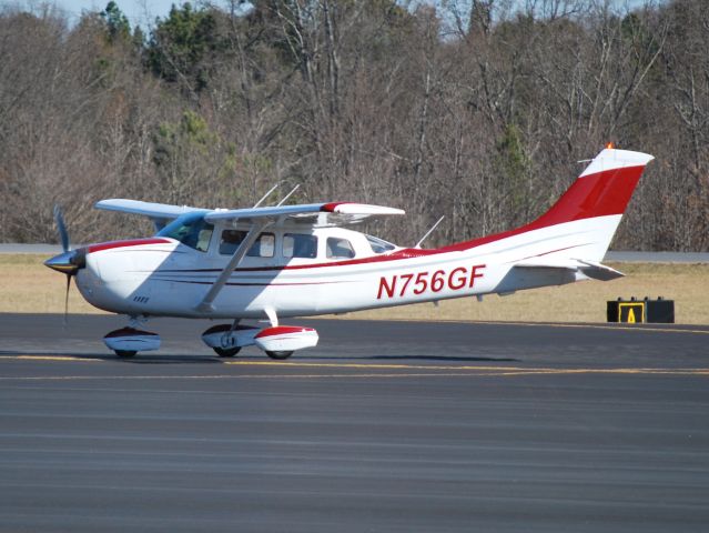 Cessna 206 Stationair (N756GF) - New paint at KJQF - 2/1/13