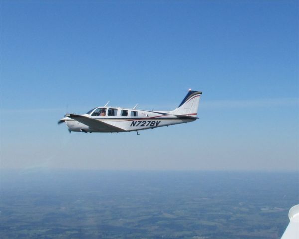 Beechcraft Bonanza (36) (N727BV) - Flying back from GA62.  Joe Golden, pilot. Photo by Dann Fabian