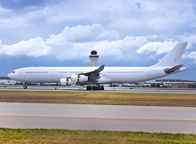 Airbus A340-300 (CS-TQZ) - Hifly 853 slowing down on runway 21L from Lisbon.br /br /4/12/2021