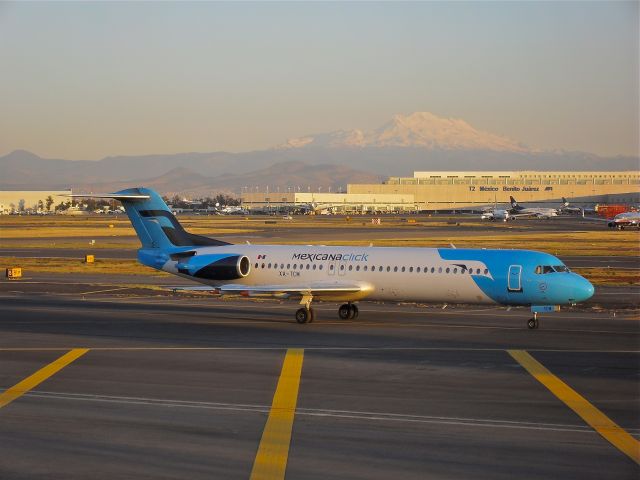 Fokker 100 (XA-TCM) - Mexicana´s Fokker 100 XA-TCM, MSN 11320 now Stored and 30 years old, is taxiing to runway 05L for take off in Mexico City Airport (Photo Feb 01th 2009).