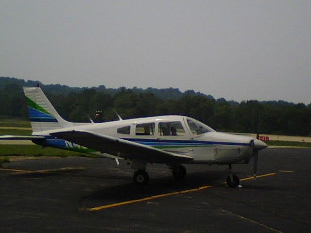 Piper Cherokee (N4364T) - Piper Warrior parked on main ramp at Washington County.