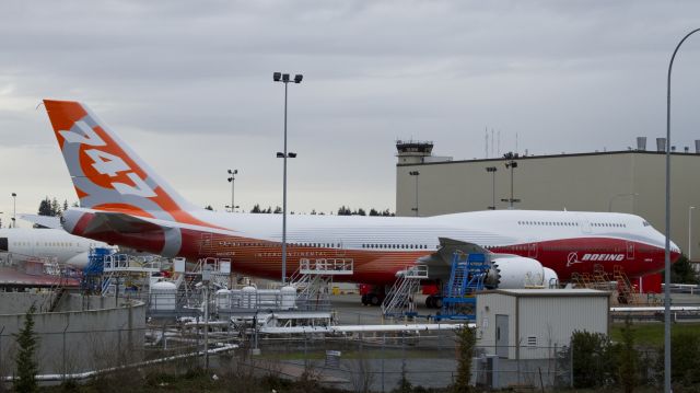 BOEING 747-8 (N6067E) - RC001 the first Boeing 747-8 Intercontinental in the sunrise livery at the fuel dock at Paine Field