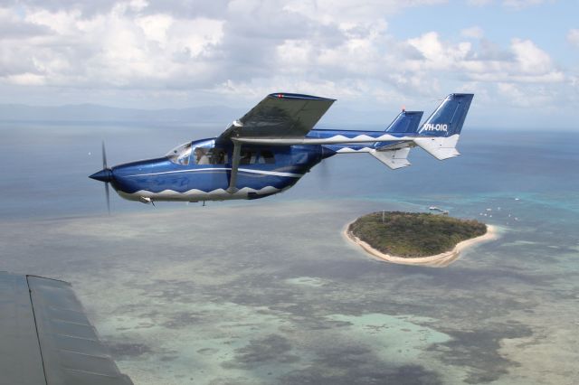 Cessna Super Skymaster (VH-OIQ) - Reef scenic flight over Green Island, Great Barrier Reef with OutbackOvernight.com