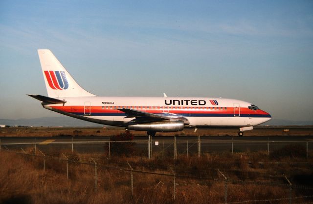 Boeing 737-200 (N996UA) - KSFO -Boeing 737-291 - CN:22456 LN:740 shows on taxi to the Runway 1R hold bars for points east. This jet delv new to Frontier Airlines 2/25/1981, and United took delv on April 1986. Color slide converted to digital. Photo date about Fall 1993, taken from the dirt parking lot on Airport Rd.