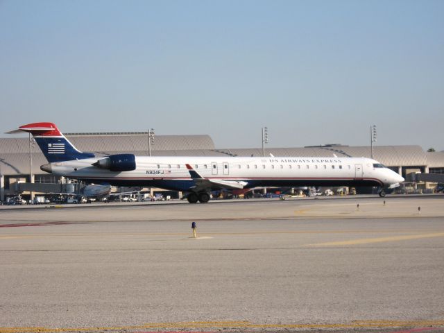 Canadair Regional Jet CRJ-900 (N904FJ) - Holding on RWY 19R