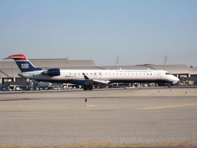 Canadair Regional Jet CRJ-900 (N904FJ) - Holding on RWY 19R