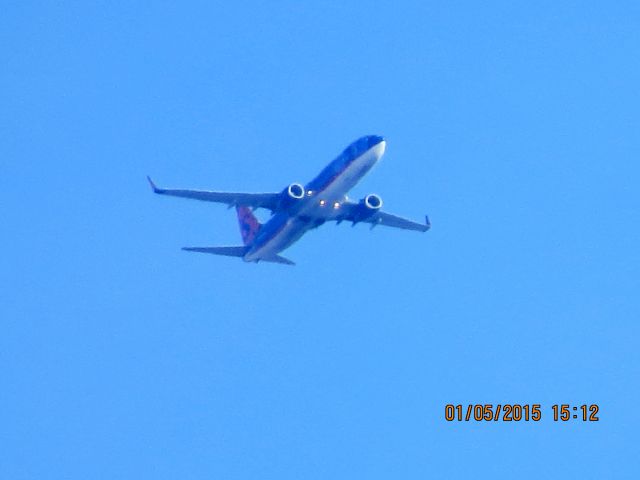 Boeing 737-800 (N815SY) - Sun Country flight 136 from Joplin Mo to DFW over Southeastern Kansas at 15,000 feet.