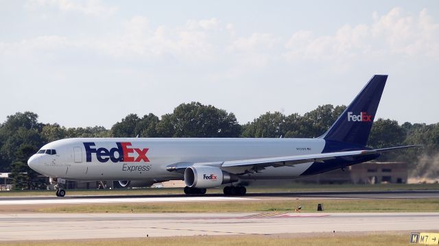 BOEING 767-300 (N131FE) - "Alanis" departing 18R