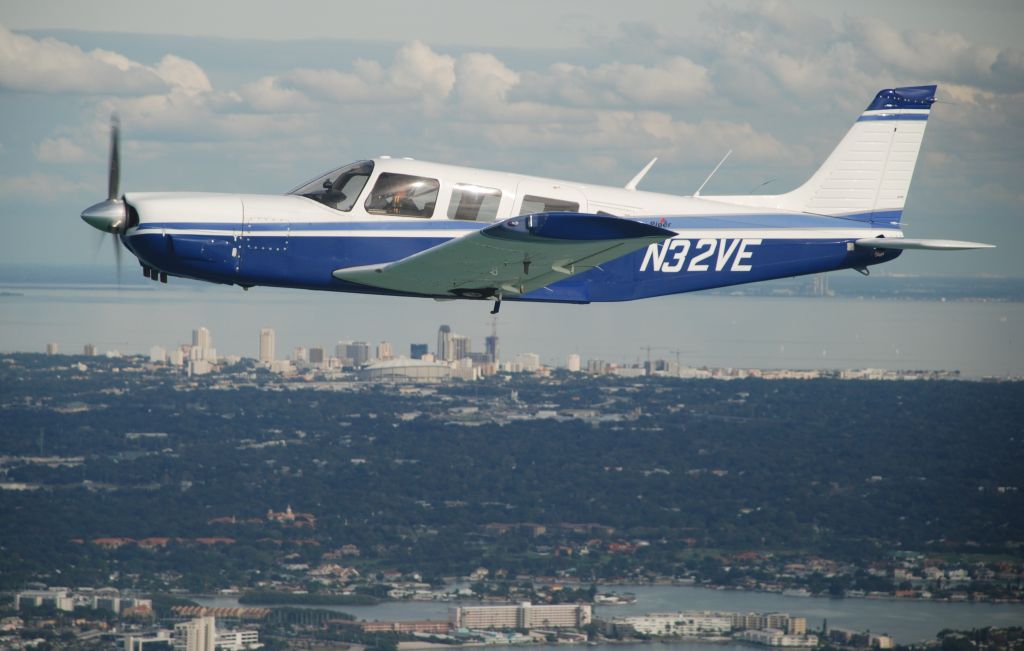 Piper Saratoga (N32VE) - Over St. Petersburg, FL skyline