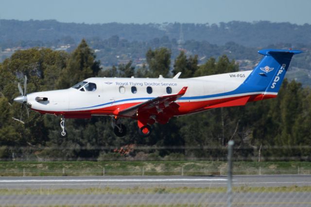 Pilatus PC-12 (VH-FGS) - About to put down on runway 05. Wednesday, 21st May 2014.