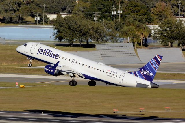 Embraer ERJ-190 (N339JB) - "BYO Blue" lifting off RWY 1R at KTPA on the way to KBOS, 11/29/2014.